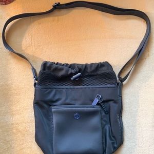 Lululemon small hobo bag with adjustable strap.